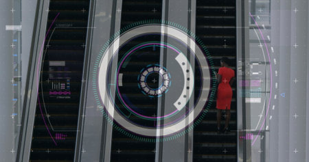 Image of data processing and scope scanning over diverse businesswomen using escalator. Global...