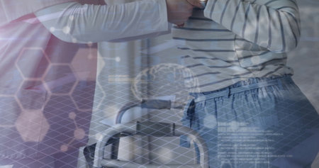 Image of data processing over caucasian physiotherapist with senior female patient. Global medicine, connections, computing and data processing concept digitally generated image.の写真素材