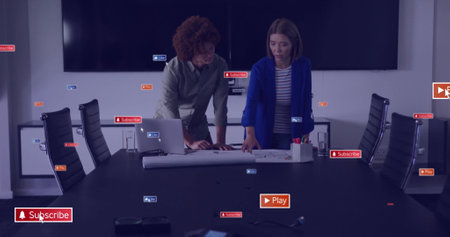 Image of social media icons with texts over diverse colleagues discussing work in office. Global...