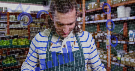 Image of data processing over caucasian man grocery shopping. Global shopping, business, connections, computing and data processing concept digitally generated image.の写真素材