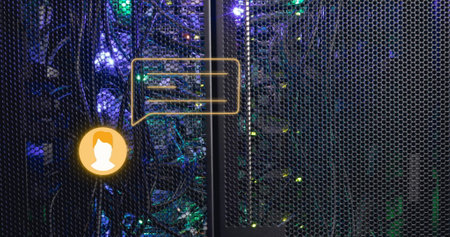 Image of orange chat bot message icon over glowing computer servers. Data, digital interface, connection, processing, network and communication, digitally generated image.の写真素材