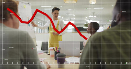 Image of financial data processing over diverse colleagues having meeting in office. Global finances, business and digital interface concept digitally generated image.の写真素材