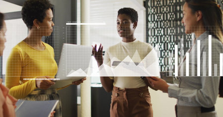 Business data analytics image over diverse team discussing in office. Teamwork, collaboration, technology, strategy, planning, meetingの写真素材