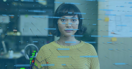 Data visualization image over woman in yellow sweater looking forward. Technology, graphics,...