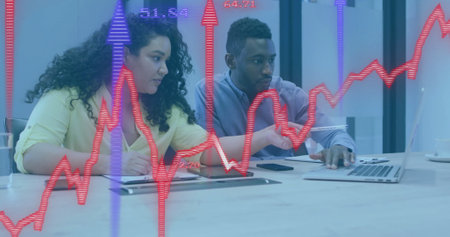 Analyzing financial data, business colleagues with stock market graph image over them. Finance, data...