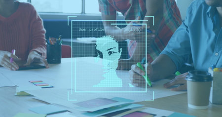 Image of portrait scans processing over diverse designers at design meeting. Digital interface, network, business, teamwork, creativity and global communication, digitally generated image.の写真素材