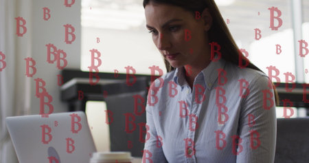 Image of bitcoin icons over caucasian businesswoman using smartphone. Global communication, business, finance and data processing concept digitally generated image.の写真素材