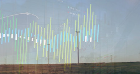 Image of financial data processing over wind turbines. Global environment, finance, business, connections, computing and data processing concept digitally generated image.の写真素材