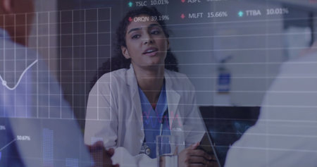 Image of multiple graphs and trading boards over diverse doctor discussing patient reports. Digital...