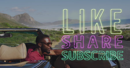 Image of like text over african american man in car. social media and communication interface concept digitally generated image.の写真素材