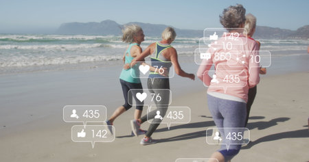 Image of social media data processing over diverse women exercising on beach. Global fitness, networks, computing, digital interface and data processing concept digitally generated image.の写真素材