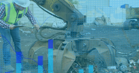 Image of financial data and graphs over caucasian male worker and machines on junkyard. economy, finance, recycling and waste utilization concept digitally generated image.の写真素材