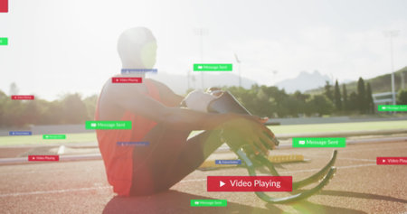 Image of notification bars, african american athlete wearing prosthetic leg at race track. Digital composite, multiple exposure, social media reminder, fitness, disability, sports, competition.の写真素材