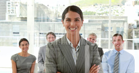 Image of data processing over diverse business people at office. Global business, computing and digital interface concept digitally generated image.の写真素材