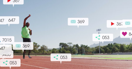 Image of notification bars, african american athlete running and raising hand for completing lap. Digital composite, multiple exposure, social media reminder, fitness, disability, sports concept.の写真素材