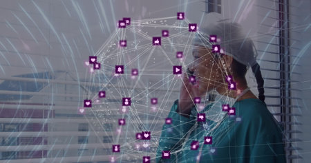 Image of network of connections over biracial female doctor using smartphone. Network, medicine, health, communication and technology concept digitally generated image.の写真素材