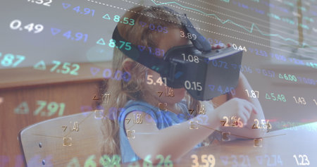 Image of financial data processing over caucasian girl using vr headset. Global technology, finances and digital interface concept digitally generated image.の写真素材