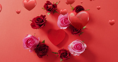 Image of red hearts over roses on red background. Valentine's day, love and romance concept digitally generated image.の写真素材