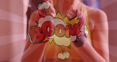 Image of boom text over caucasian female boxer. international youth day and celebration concept digitally generated image.の写真素材