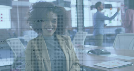 Image of charts and data processing over smiling biracial businesswoman in office. business, global...