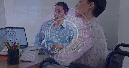 Image of round scanner against diverse man and woman discussing at office. Computer interface and...