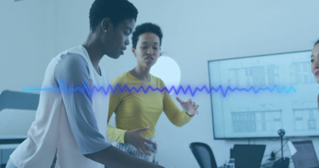 Image of music equalizer over three diverse female colleagues discussing together at office....