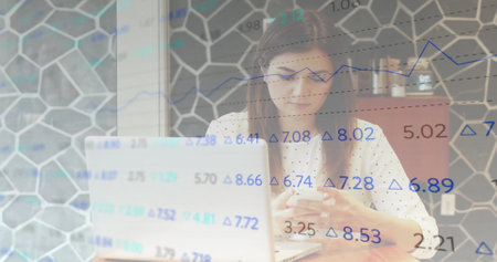 Image of financial data processing over caucasian businesswoman using smartphone in office. Global...
