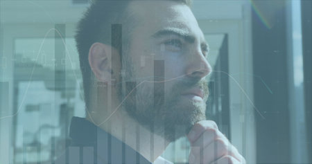 Image of data processing over caucasian businessman in office. Global business and digital interface concept digitally generated image.の写真素材