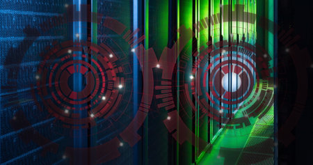 Image of two round scanners spinning against computer server room. Computer interface and business...