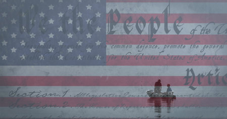 Image of American flag waving with text of American constitution over two men in fishing boat in the...