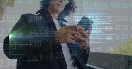Image of financial data and code over biracial man using smartphone. economy, finance, communication...