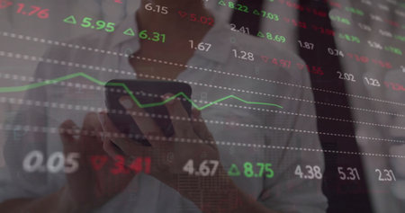 Image of financial data processing over caucasian businesswoman using smartphone in office. Global...