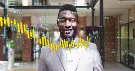 Image of multiple graphs with changing numbers over smiling african american man. Digital composite, multiple exposure, report, growth, digits, abstract and business concept.の写真素材