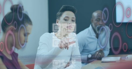 Image of qr code and data processing over diverse business people in office. Global connections,...