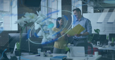 Image of financial data processing over businessman working in office. Global shipping delivery business data processing and technology concept digitally generated image.の写真素材