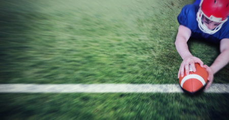 Image of globe face mask over american football ball. Global covid 19 pandemic concept, digital...