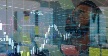 Image of data processing over caucasian businessman taking notes. Global business and digital...