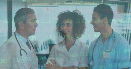 Image of data processing over diverse group of doctors. Global medicine, technology, data processing and digital interface concept digitally generated image.の写真素材