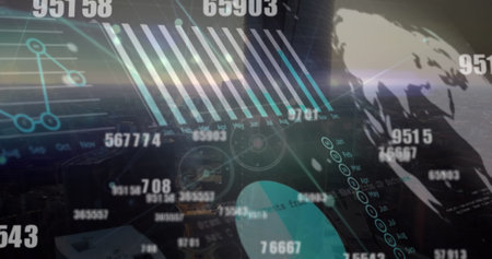 Image of changing numbers and statistical data processing against aerial view of cityscape. Global networking and business technology conceptの写真素材