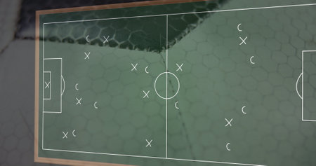 Image of drawing of game plan over green background. sports and competition concept digitally generated image.の写真素材