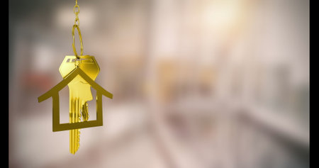 Image of keys with house keychain over blurred background. Moving house and digital interface concept digitally generated image.の写真素材