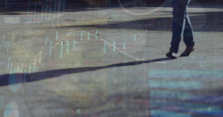 Image of financial data processing over people walking on street. Global business, finances and digital interface concept digitally generated image.の写真素材