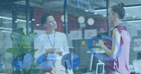 Image of financial data processing over diverse business people in office. Global business, finance, computing and data processing concept digitally generated image.の写真素材