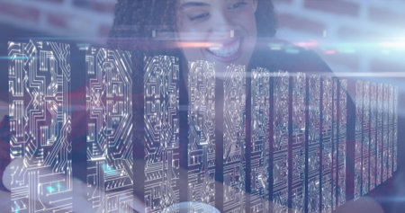 Image of light spots over biracial woman talking and drinking coffee. Global business and digital interface concept digitally generated image.の写真素材