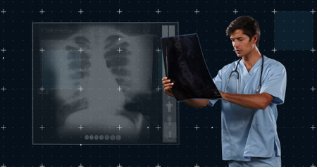 Image of caucasian male doctor with x ray photo and x ray photo on black background. Health,...