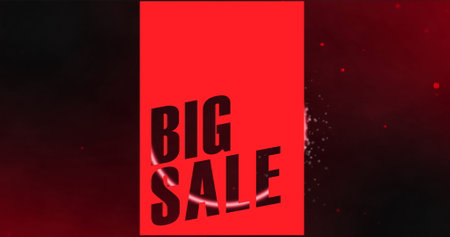 Image of big sale text banner against red spots floating on red background. Sale discount and retail business conceptの写真素材