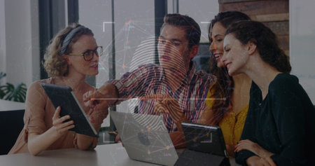 Image of fingerprint scanner over diverse colleagues using digital tablet and discussing. Cyber...