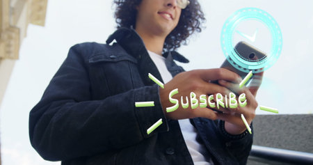 Image of clock moving and subscribe text over biracial businessman using smartphone. global business and digital interface concept digitally generated image.の写真素材