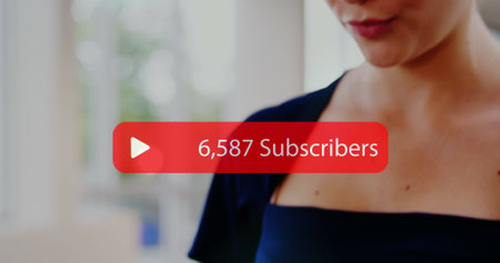 Image of text covid cover up and using smartphone over caucasian man using smartphone. Happy business woman with the word the table against yellow background.の写真素材