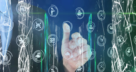 Image of hand using touchscreen with business and data sharing icons over communication networks....